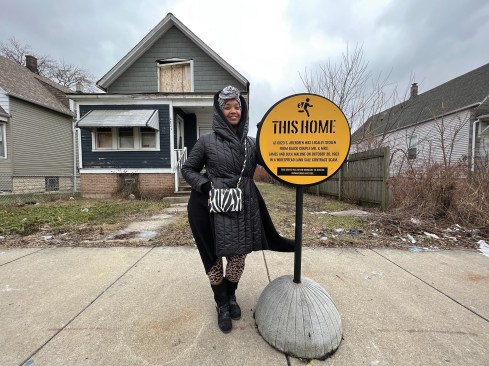 Tonika Lewis Johnson and house markers from the Inequity for Sale project.