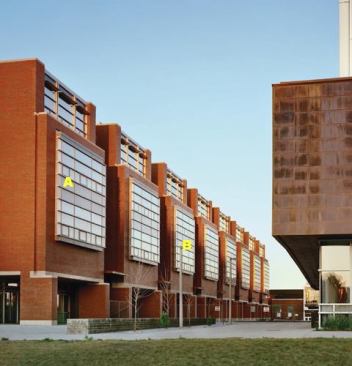 A  Heat Mirror TC88 Glazing Southwall Technologies 
www.southwall.com    An insulating glass unit with a thin layer of heat mirror film suspended between two layers of glass  Creates a slightly mirrored finish  Prevents the majority of the sun’s heat from entering interior spaces, reducing heat gain  Blocks UV 
B  Archetype Exterior Lighting Standard KIM LIGHTING 
www.kimlighting.com Die-cast aluminum housing with a variety of powder coating options  Round poles  Outdoor cutoff luminaire  Available in 70 to 400 watts in the larger model, up to 175 watts in the smaller  HID source  Multiple sizes allows the fixture to be used throughout a site, from parking to walkway to building entry