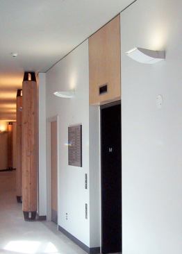 Streamline 6010 Series Rebelle Architectural Lighting www.rebellelighting.comThis wall-mounted ceiling washer fixture has a cast aluminum housing with a 4 1/2-inch profile. The source is a metal halide T6 or G12 lamp in 39, 70, or 150 watts. Recessed into the wall is an octagonal junction box and the anchor end of a cantilevered support arm to keep the fixture stable. The source is protected by a 5/32-inch-thick pane of tempered glass, and the fixture is suitable for indoor and outdoor use. Outdoor options are UL listed for wet locations.