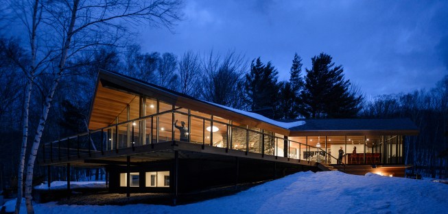 The wheelchair-accessible Trinocular House in Stowe, Vt., is sited between three landscapes: a flat orchard, a sloped hilllside, and a body of water. Each landscape is “faced and framed through a gable, and conjoined with a continuous glass-fronted trefoil circulation loop, allowing for an unbroken yet differentiated view of the site.”