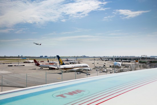 The view of the runway from the infinity pool on the hotel roof