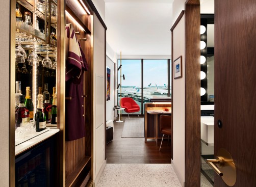 A hotel room, complete with martini bar and Womb chair
