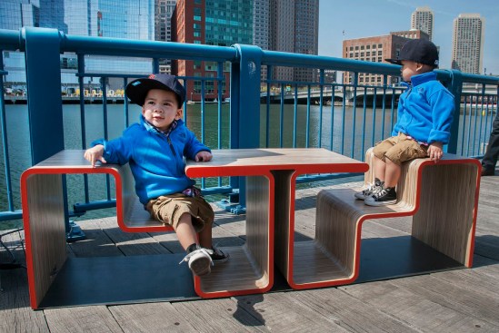 Located outside the Boston Children’s Museum, Twofold is designed as a bench for adults and a table for children.