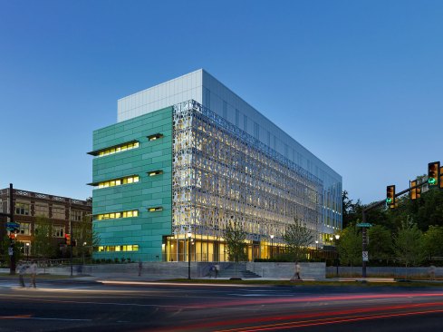 A view of the building at dusk.