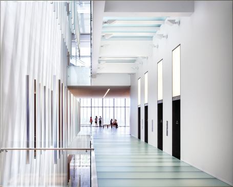 In the public elevator lobby on a typical floor hangs an installation by James Carpenter (at left). 