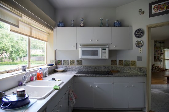 The first-floor kitchen, with a view into the dining and living area to the right