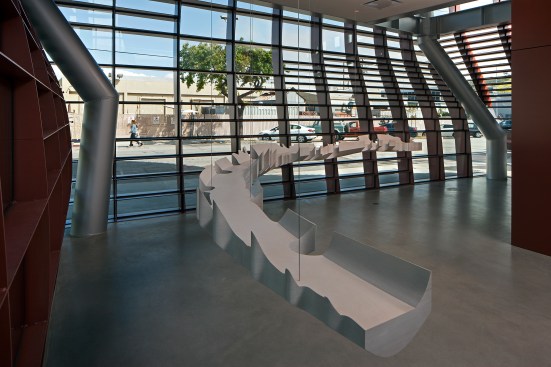 Reception area interior, with sculpture designed by the architect to hold gifts for departing guests