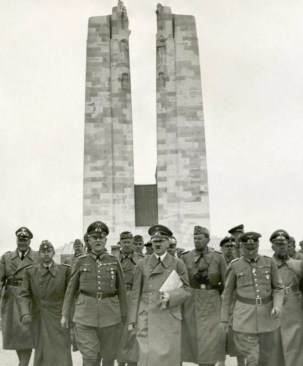 Photograph of Hitler at Vimy Ridge, France, in front of a memorial honoring the more than 60,000 Canadians who died in service during World War I, published by various news outlets on June 4, 1940. A few days earlier, the Canadian press had alleged that this towering limestone memorial, designed by Toronto sculptor Walter Allward, had been deliberately bombed by German aircraft. German authorities denied the claim, releasing this image of Hitler touring the (intact) monument, accompanied by Keitel and others. Yet even as they assuaged Allies’ fears, the Nazis were secretly plotting the strategic demolition of other WWI monuments.