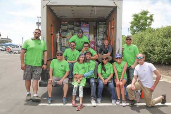 Volunteers help with HomeAid's Builders for Babies event.