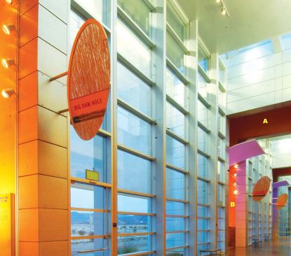 The public spaces are highly trafficked and showcase a series of resilient products, while still featuring bright colors to contribute to the welcoming and educational atmosphere. 
A  Interior paint Frazee Paints 
www.frazee.com    Product line includes paints, primers, sealers, and undercoats  Various finishes and different levels of gloss  Latex finish creates a washable surface  Extensive color palette  Available in zero-VOC, low-odor formulations 
B  Gypsum drywall USG 
www.usg.com    Gypsum core faced with recycled paper for both finished surface and backing  Gypsum core is fire resistant  Humitek panels off er mold and mildew resistance in the gypsum core  Firecode panels feature formulated core to correspond to diff erent code ratings  Abuse-resistant panels resist surface gouges and impressions associated with high-traffic wear and tear  Varied thicknesses depending on options selected  Different sheet sizes for different installations