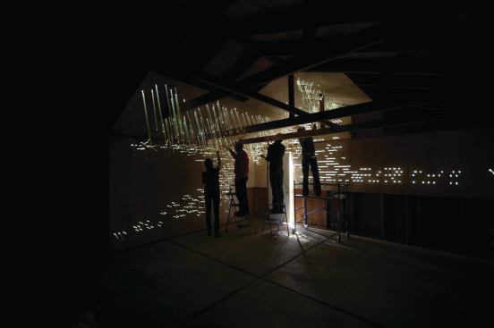 The tubes let air and light into the garage, creating a mysterious kind of glow and breaking down the barrier between the outside and inside environments.