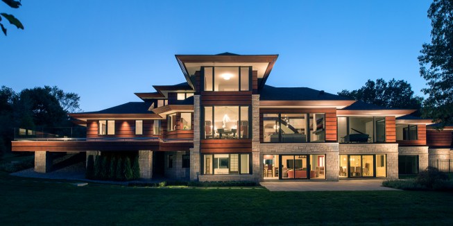 The homeowners wanted to take full advantage of the remarkable panoramic views of their rolling 5 acres in Michigan by including larger windows and doors that would span the back of their home. (Shown here is Weather Shield’s Contemporary Collection Casement Windows, Direct Set Windows, Sliding Patio Doors, and Hinged Doors.)