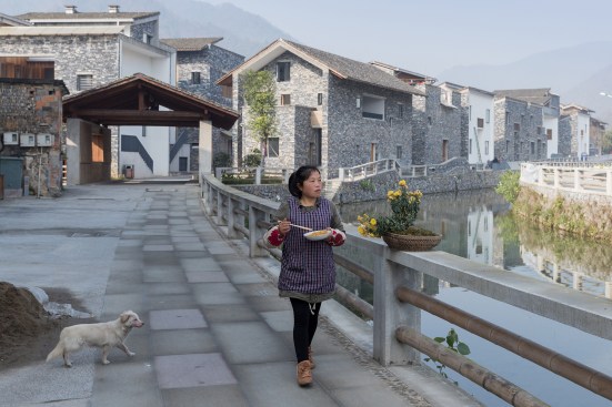 Main path in Wencun, showing new bridge and new neighborhood beyond