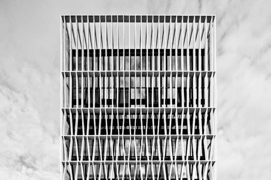 A Simple Factory Building, Singapore, 2009-2012. Detail of lightweight "Deep Veil" and awning window wall behind, designed by Erik L'Heureux, AIA.