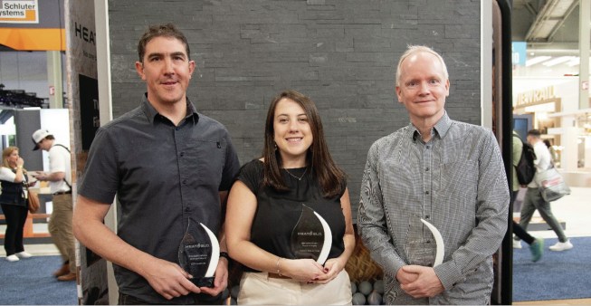 The winners of the RADA Fireplace category, sponsored by Heat & Glo, include (left to right): Gage Reese, Erin Casey, and David Shone at the 2025 International Builders’ Show (IBS) Heat & Glo booth in Las Vegas. Photo by Amanda Prieto.