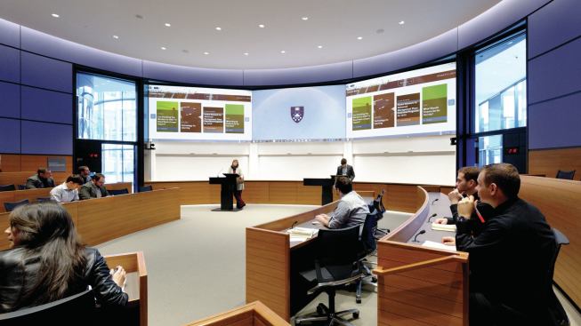The 16 elliptical classrooms on the upper two levels are laid out in different orientations to accommodate the different styles of classes in the school of management. 